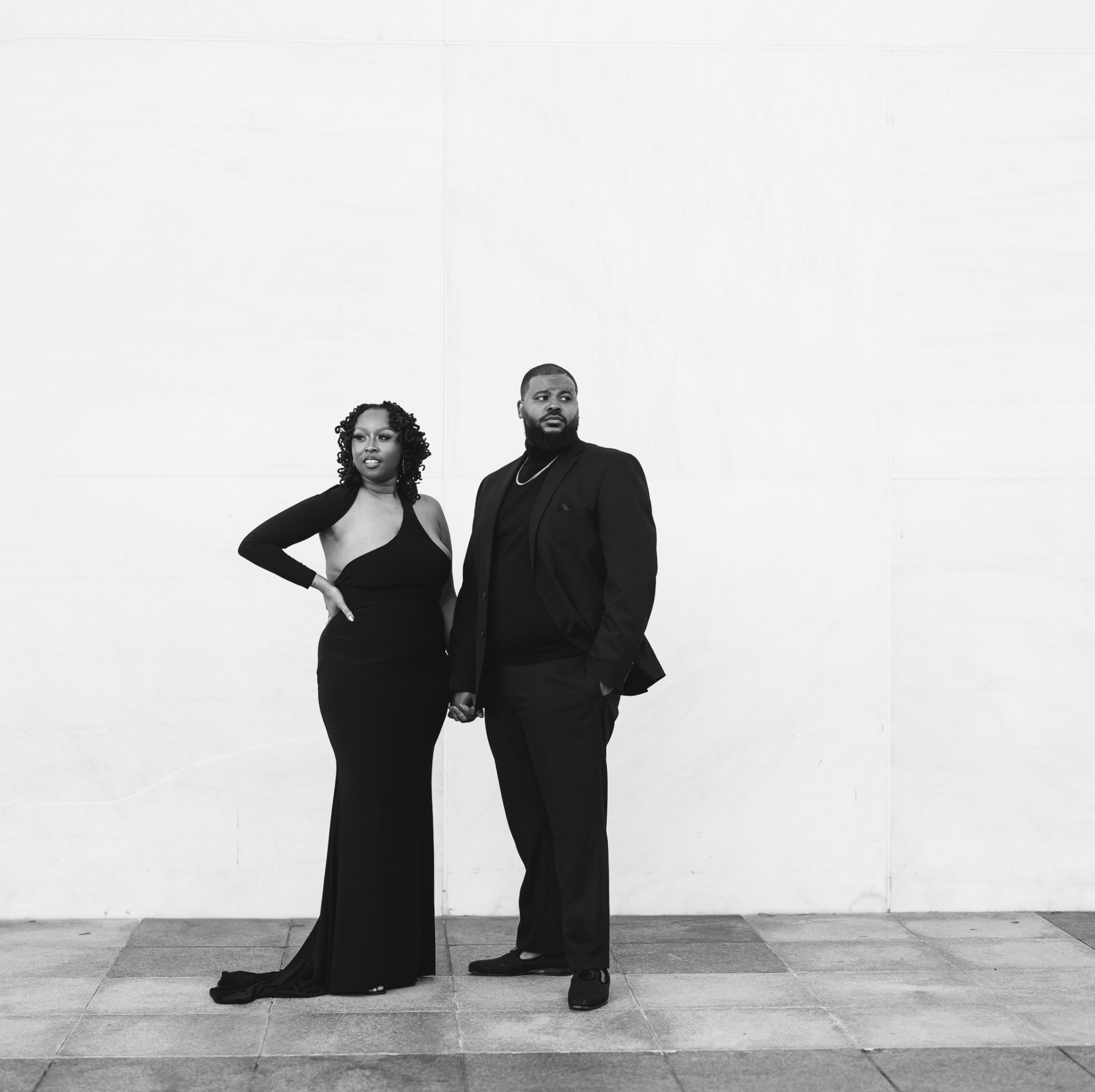 Couple all-black editorial portrait in black and white