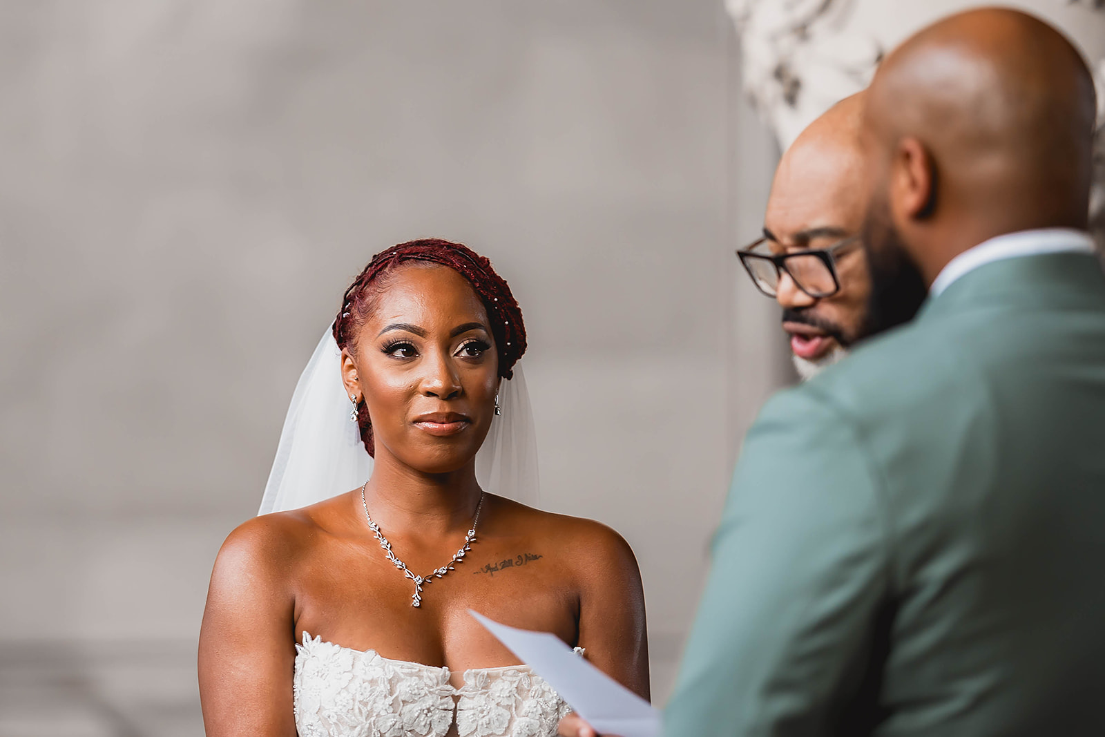 Bride emotional during vows closeup ceremony portrait