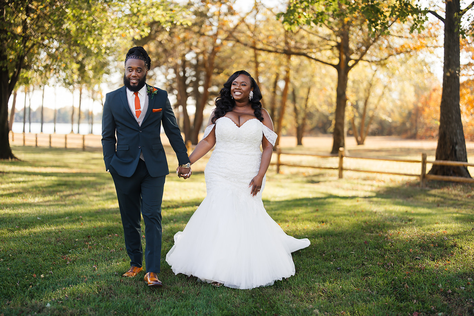 Couple walking through autumn estate