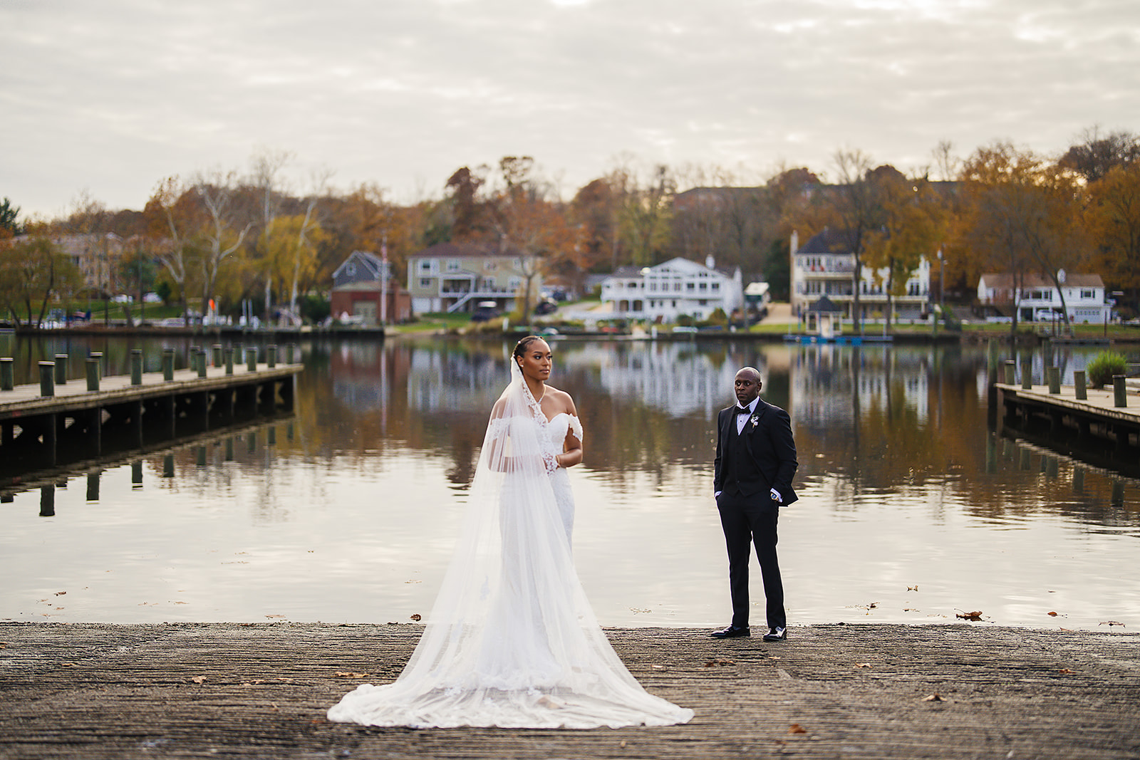 Couple on dock for autumn first look